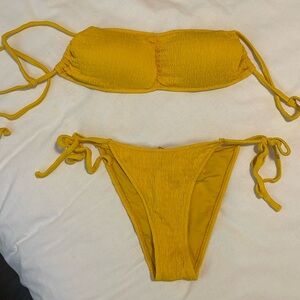 Yellow rouched bikini. Should straps, tie at back. Adjustable able strong bikini